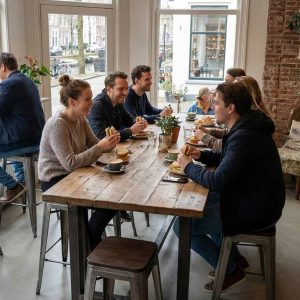 Super-Seat | Lix barkrukken metaal vintage hout | Metaal-houten barkrukken, houten tafels bij ramen; groenplanten; zicht op kanaal buiten. | Horecameubilair