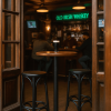 Super-Seat | Houten rond sta-tafeltje met donker bier, twee zwarte Thon barkrukken van gebogen hout in bruine pub. | Horecameubilair