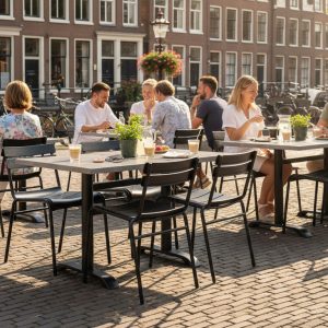 Super-Seat | Wermodin horeca (terras) tafelbladen leisteen 120x70cm | Grijze leisteen tafels, houten stoelen, metalen barkrukken op klinkerstraat. | Horecameubilair