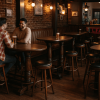 Super-Seat |Maastricht poker oud bruin café statafels Houten tafels, stoelen, barkrukken; bakstenen muren; warme verlichting; lege zitplekken. | Horecameubilair