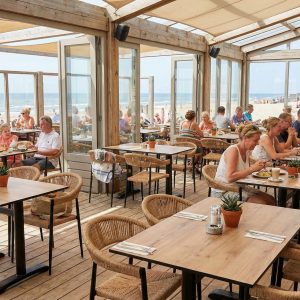 Super-Seat | Houten tafels met kastanje HPL bladen, bijpassende stoelen, grote ramen en zeezicht. | Horecameubilair