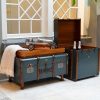 Super-Seat | Blauwe houten koffertafels met bruine leren accenten en metalen details. | Horecameubilair