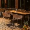 Super-Seat | Houten buitentafel met zes Ibiza wit terras stapelstoelen met kussen Licht houten tafel, witte kunststof stapelstoelen met grijze zitkussens. | Horecameubilair