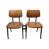 Super-Seat | Twee bruine/zwart stoelen met zwart metalen poten, verbonden, op witte achtergrond. | Horecameubilair